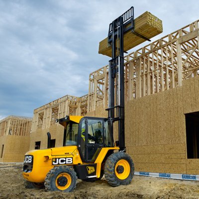 Forklift unloading machinery and industrial equipment in Welwyn Garden City